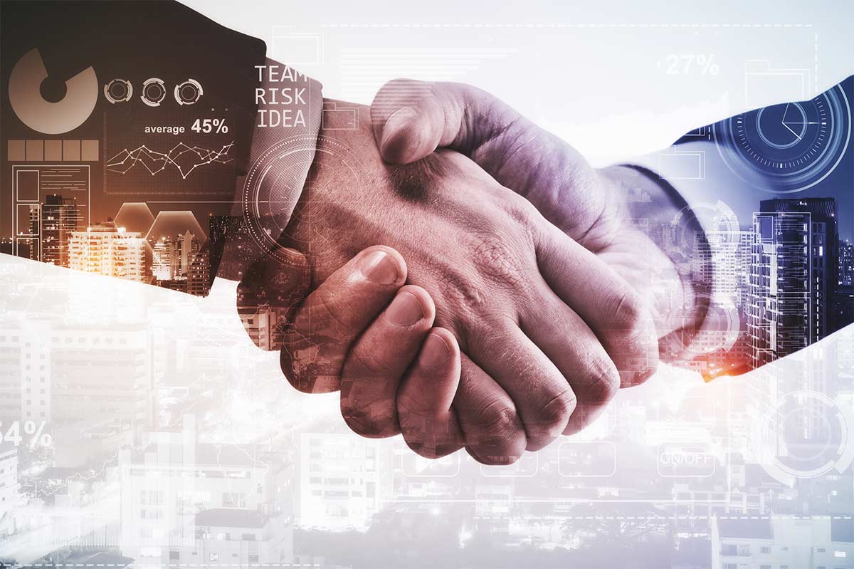 Business partnership handshake representing a trusted EMS manufacturing collaboration